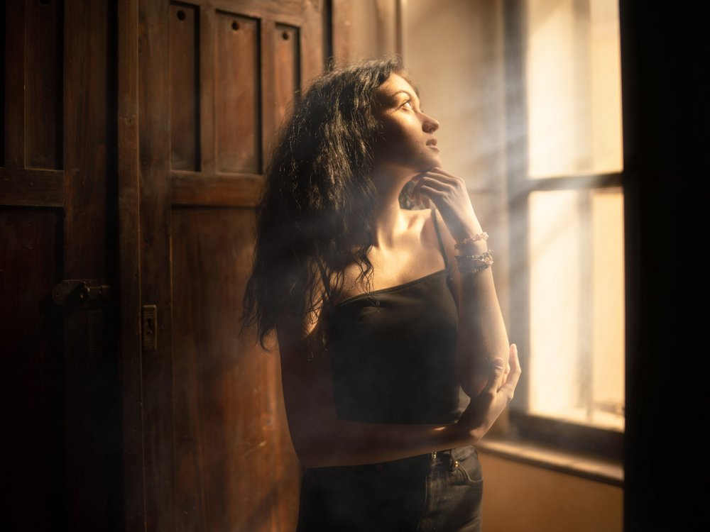Thoughtful Woman Golden Light