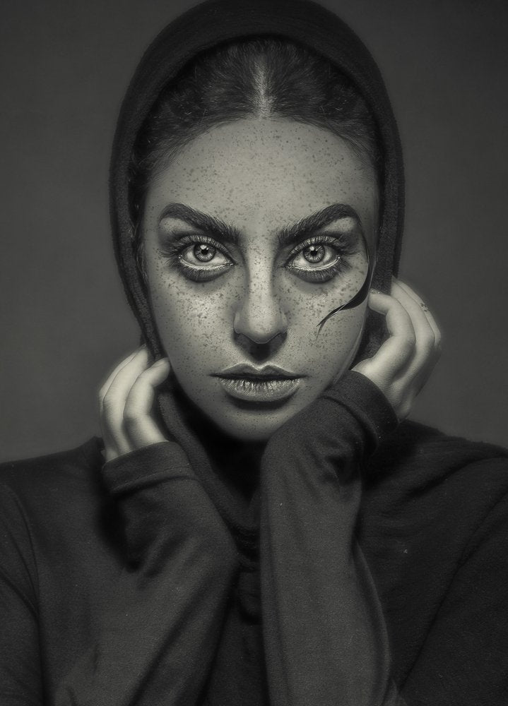 Intense Gaze Hooded Woman