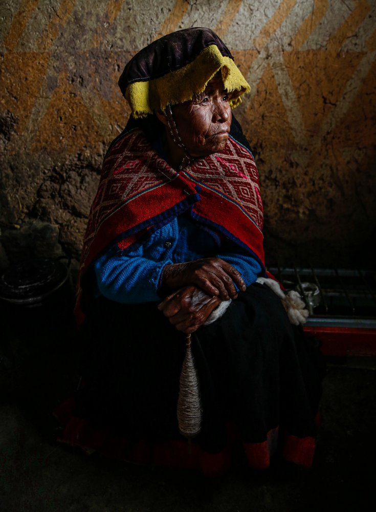 Andean Woman Spinning Yarn