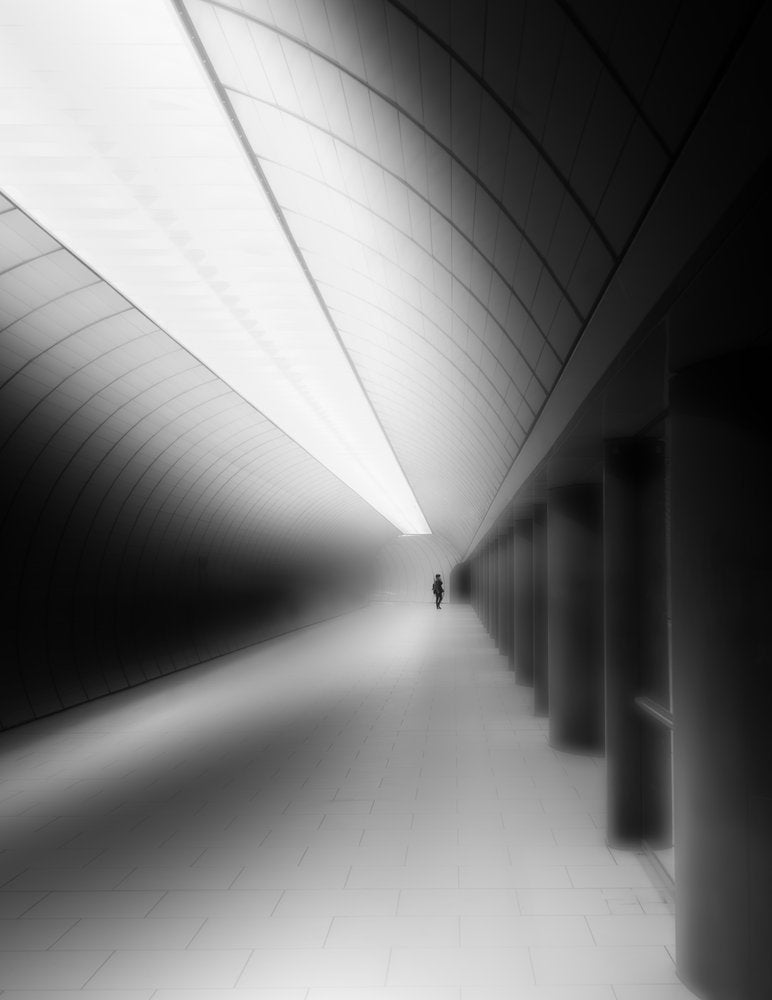 Lone Figure Modern Hallway