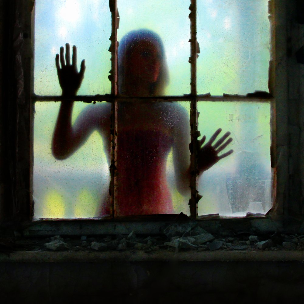 Haunting Window Silhouette