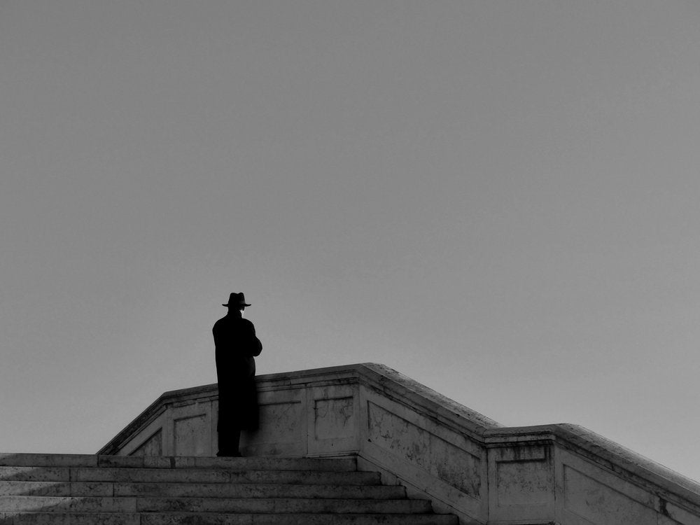 Solitary Man on Bridge
