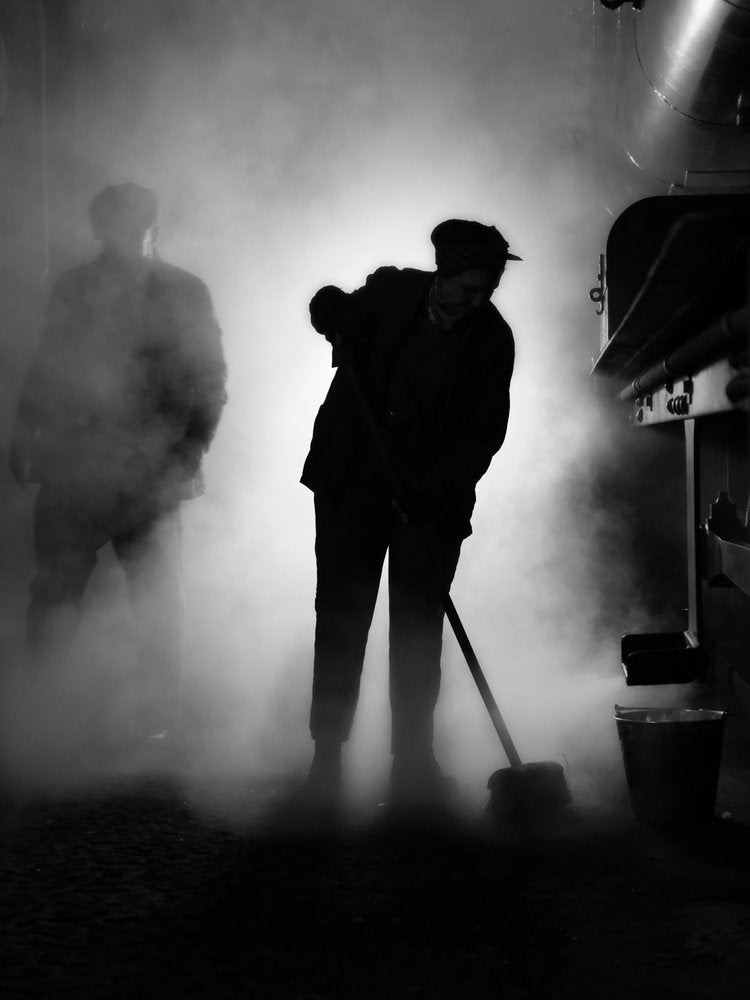 Working Man In Mist