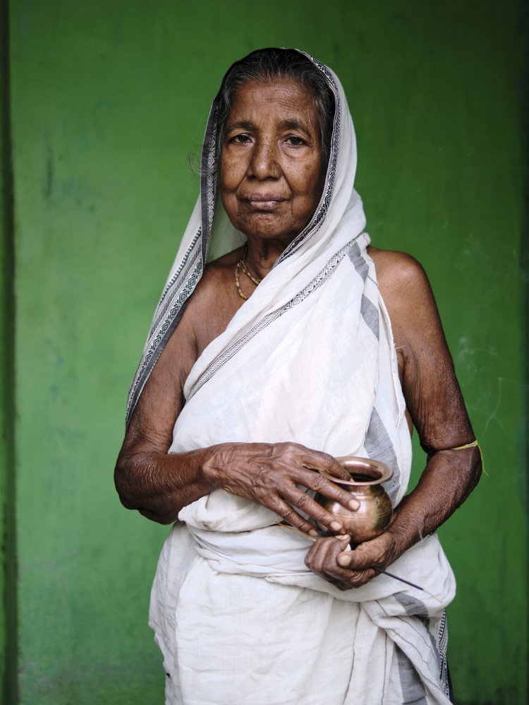 Indian Elder with Pot