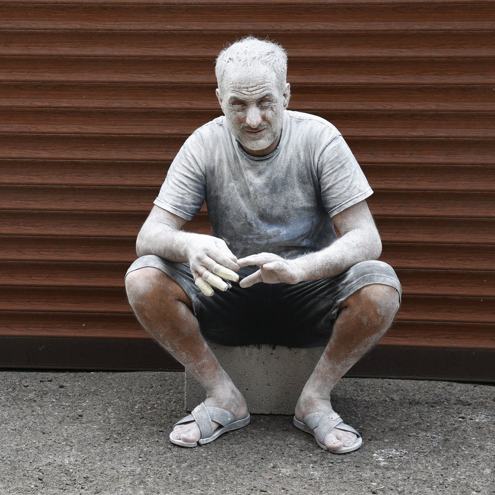 Man Covered In Dust