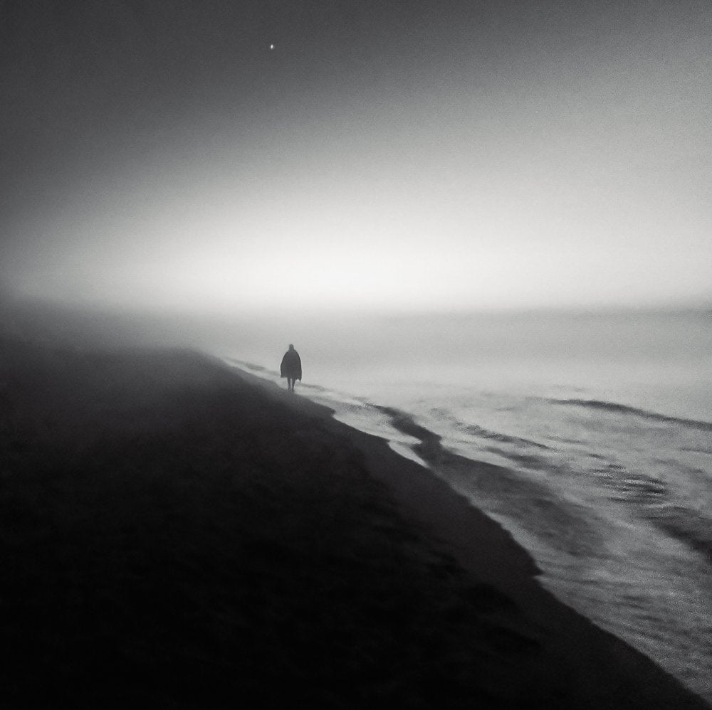 Lone Figure Misty Coast