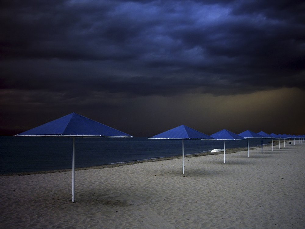 Stormy Beach Umbrellas