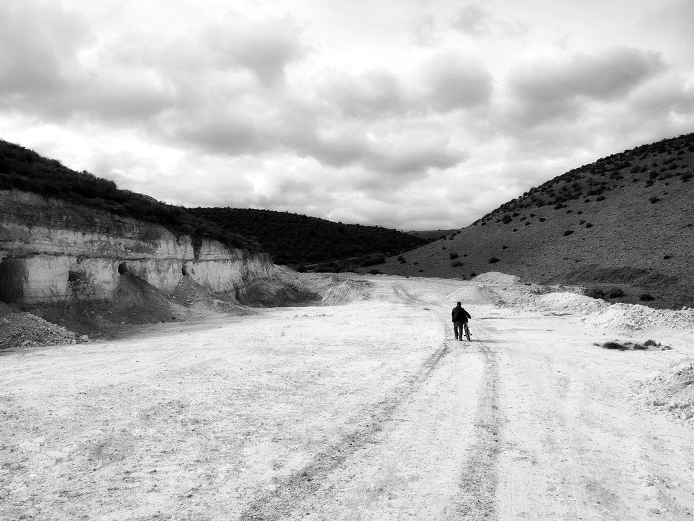 Solitary Figures Vast Landscape