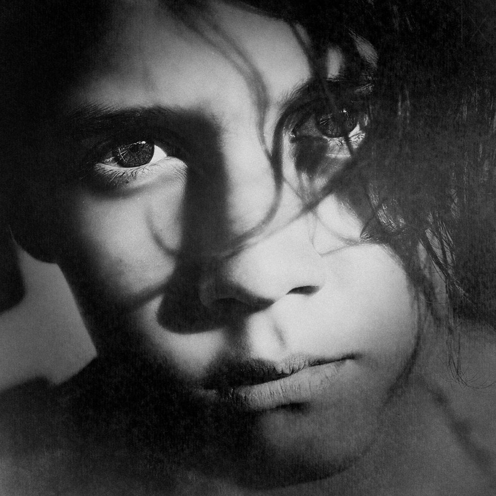 Young Face In Shadow