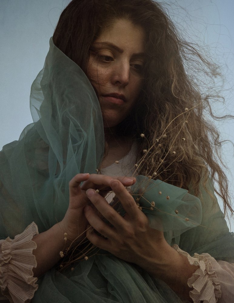 Pensive Woman with Dried Flowers