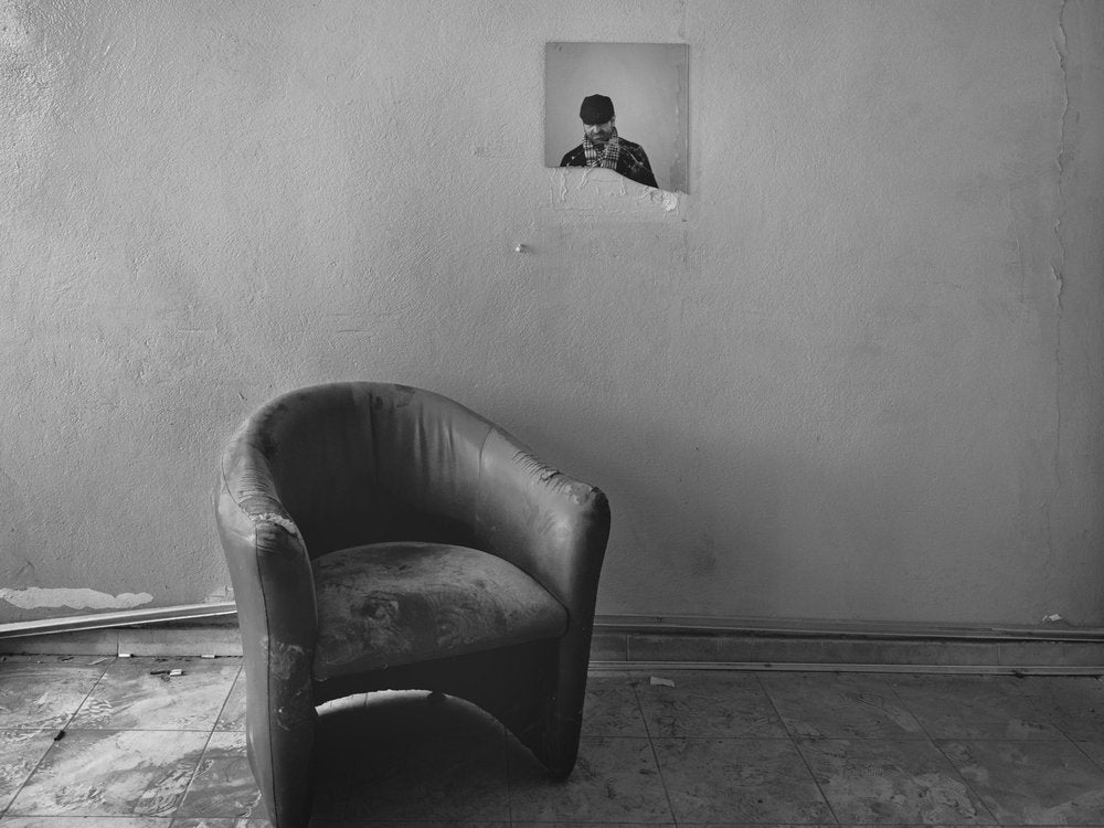 Solitary Armchair Faded Picture