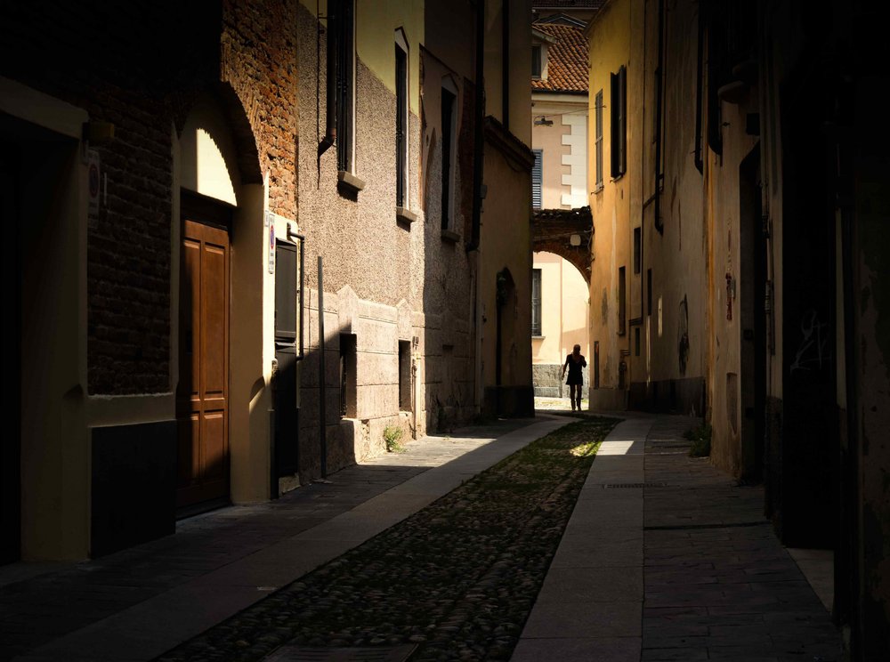Sunlit Cobblestone Alley