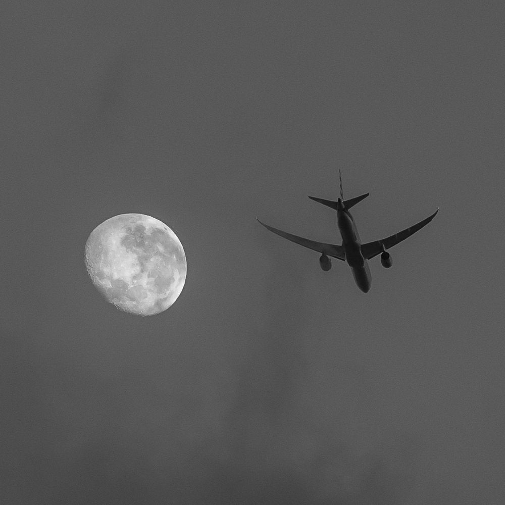 Moon and Plane