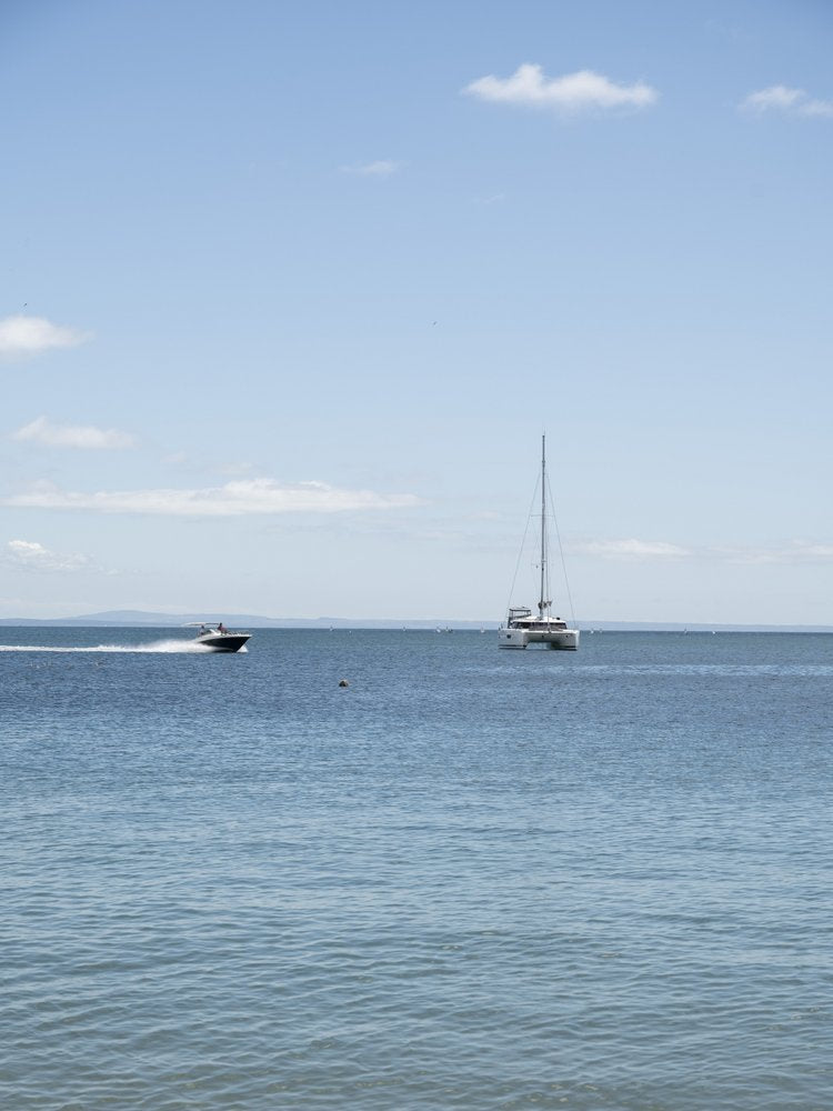 Speedboat and Sailboat
