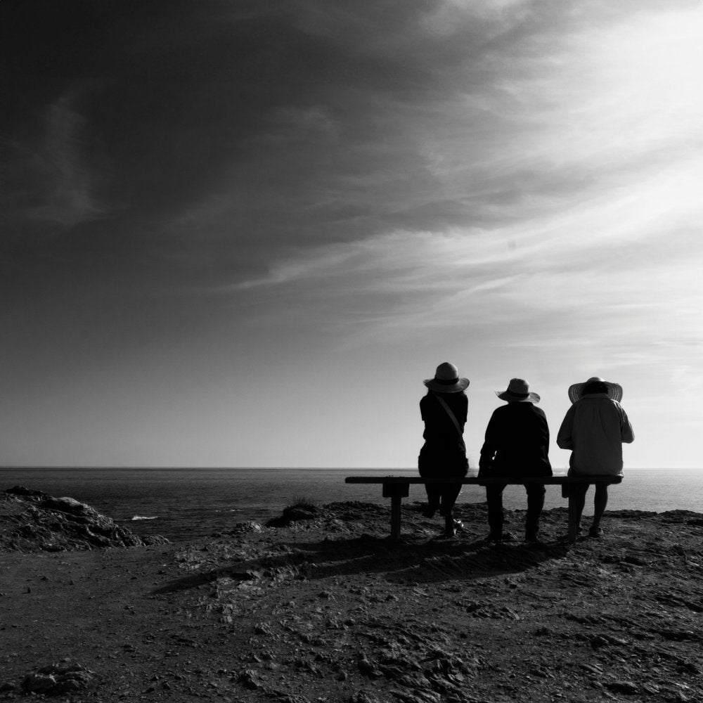 Three Women Overlooking Ocean