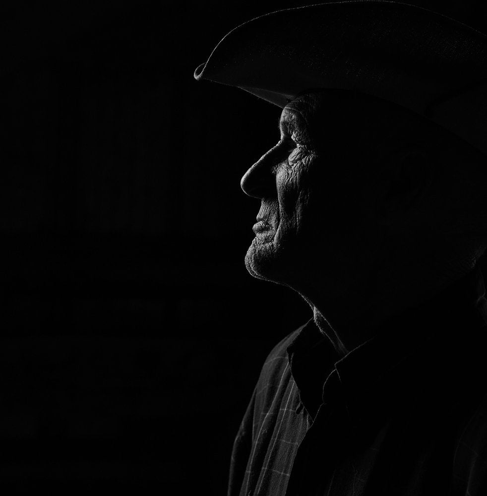 Man In Hat Profile