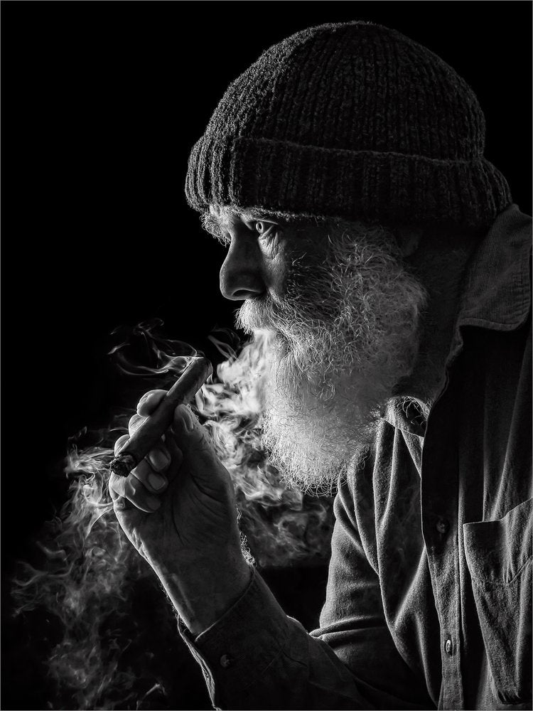 Contemplative Bearded Smoker