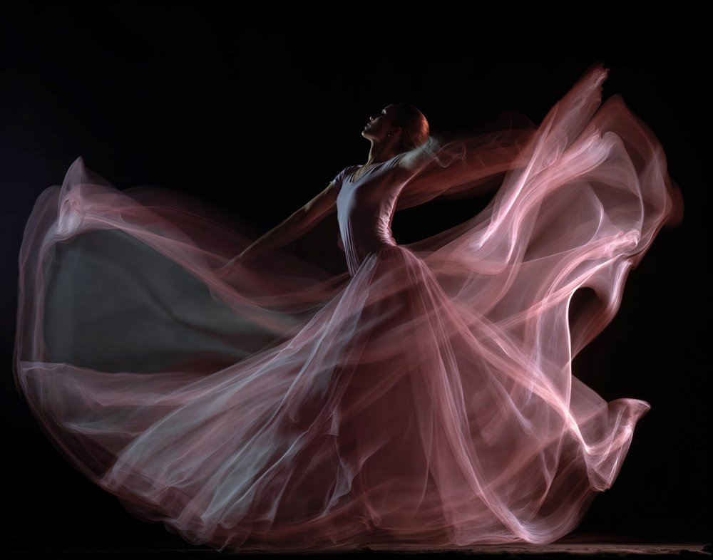 Graceful Dancer Flowing Fabric