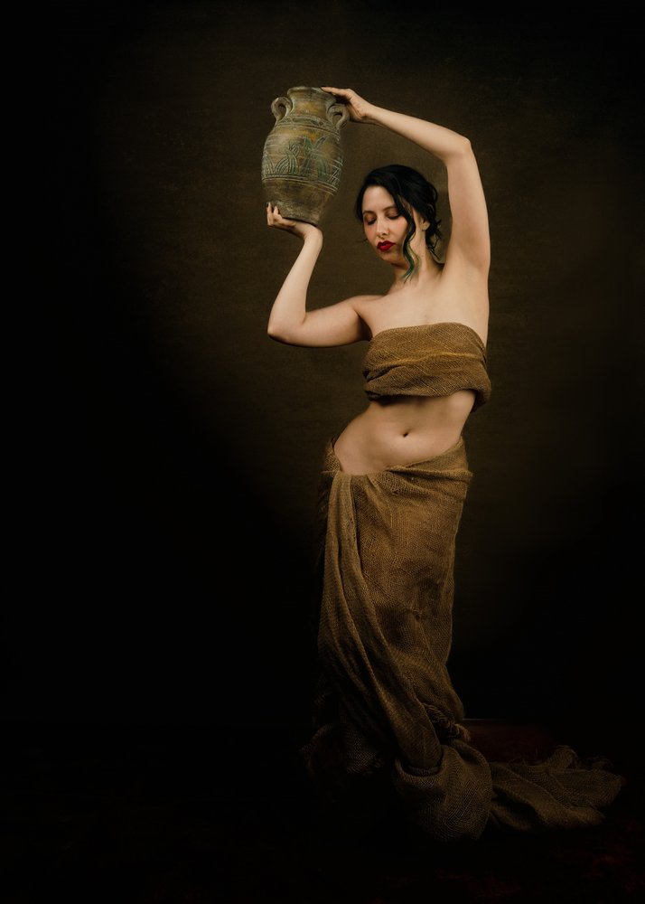 Draped Woman With Vase
