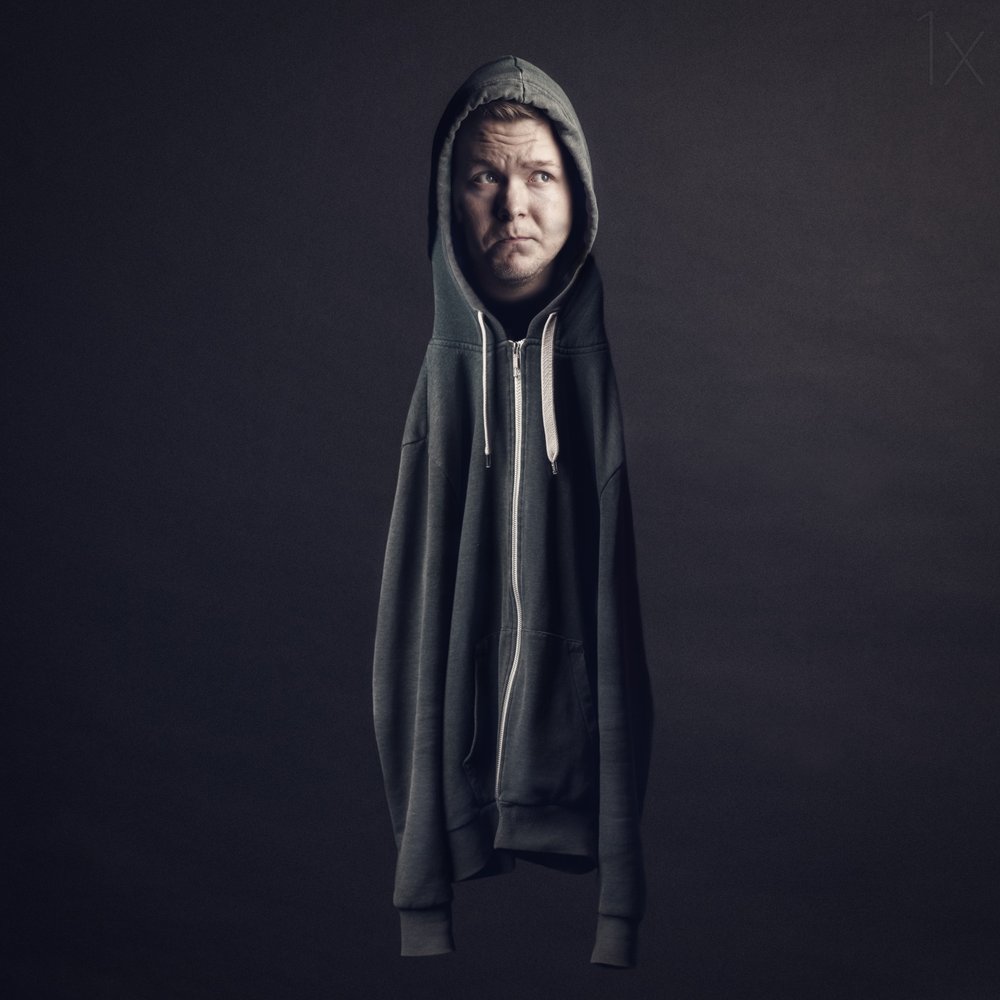 Pensive Hooded Figure