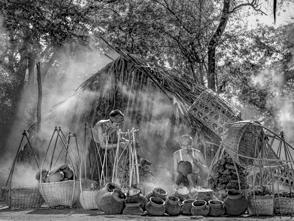 Artisans Crafting Pottery