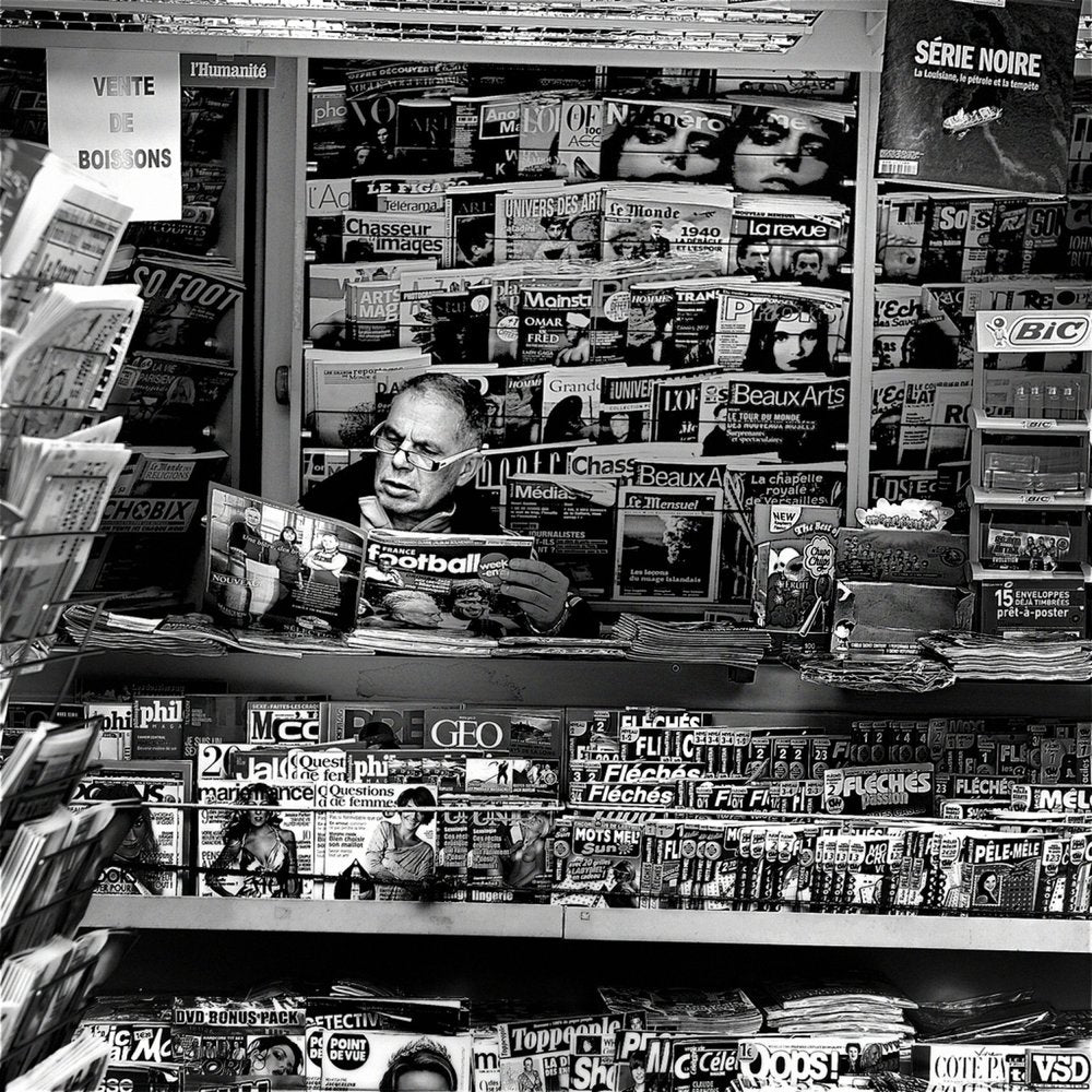 Man Reading Urban Newsstand