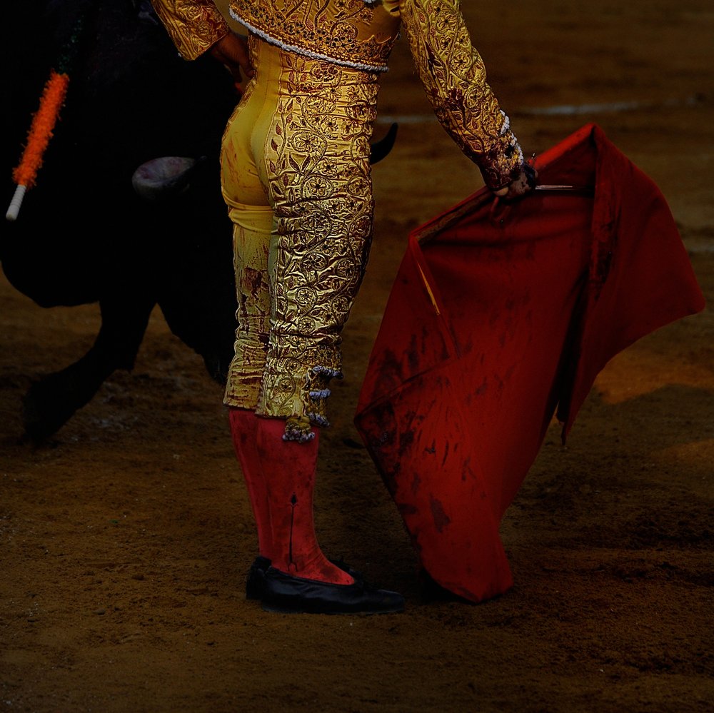 Golden Matador Red Cape