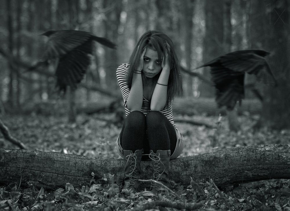 Sad Girl in Forest