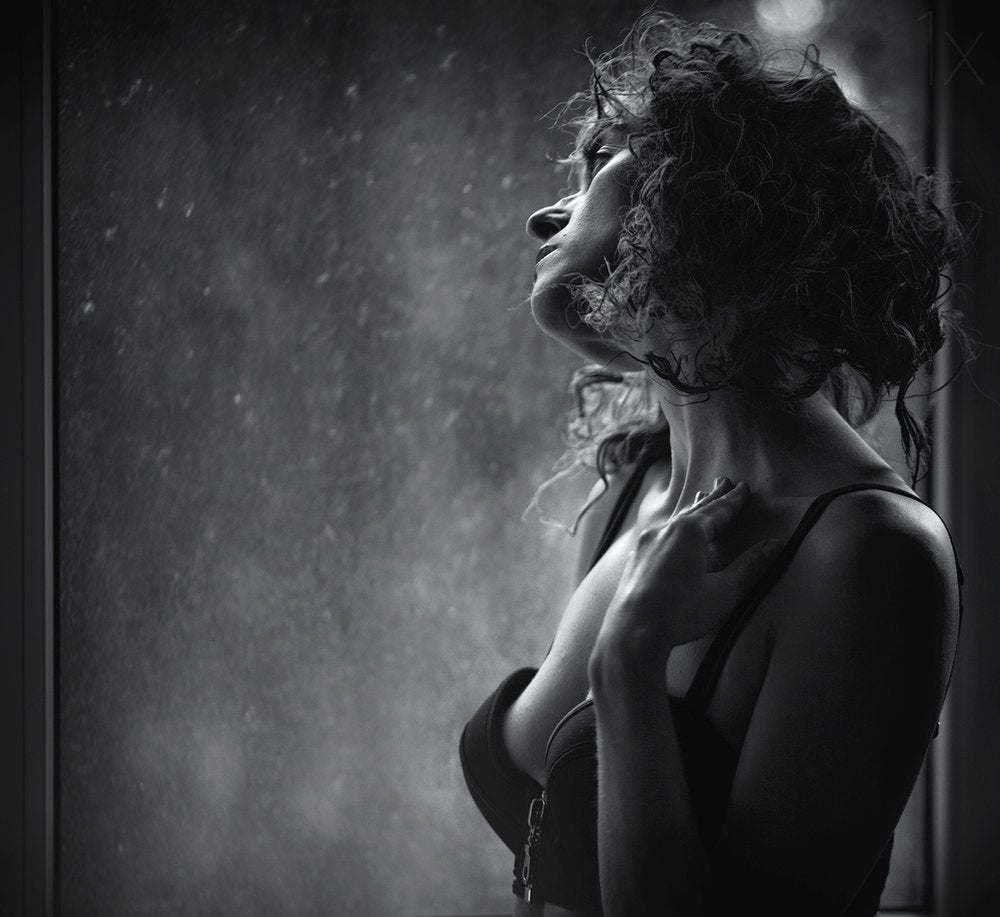 Thoughtful Woman In Rain