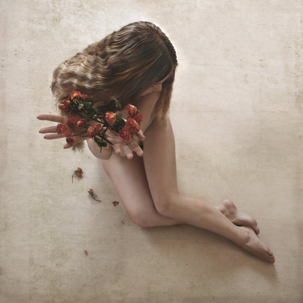 Woman Fading Roses