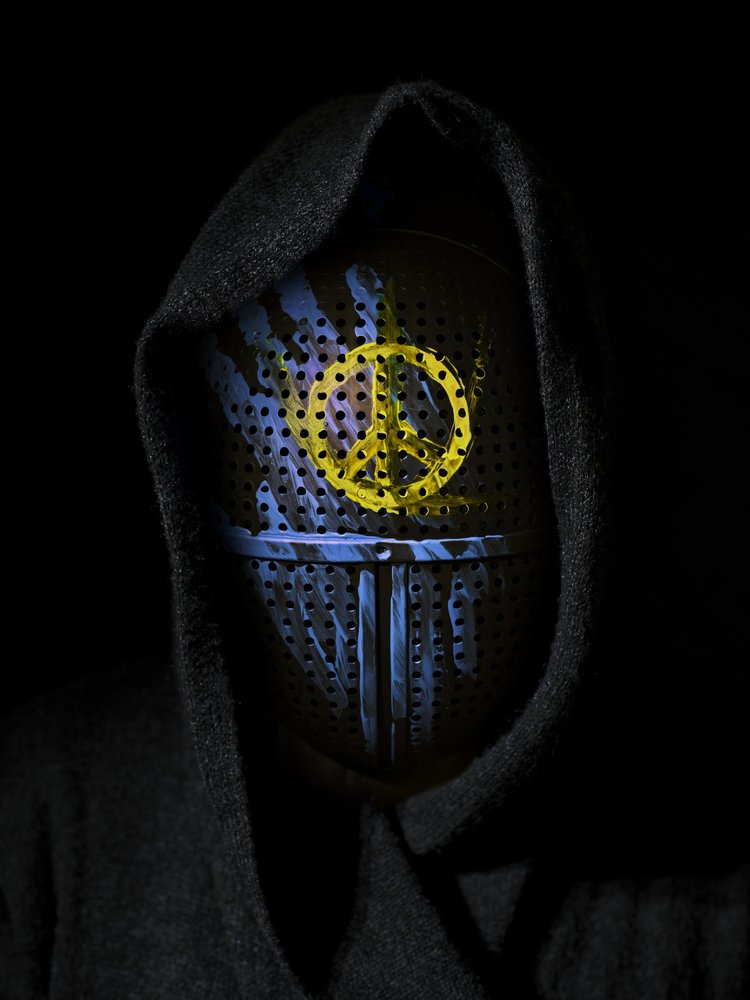 Hooded Figure Peace Symbol