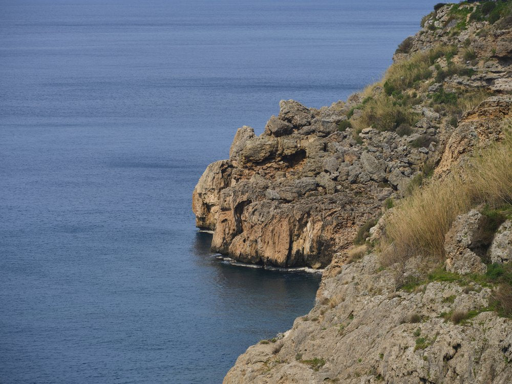 Cliffs Over Blue Sea