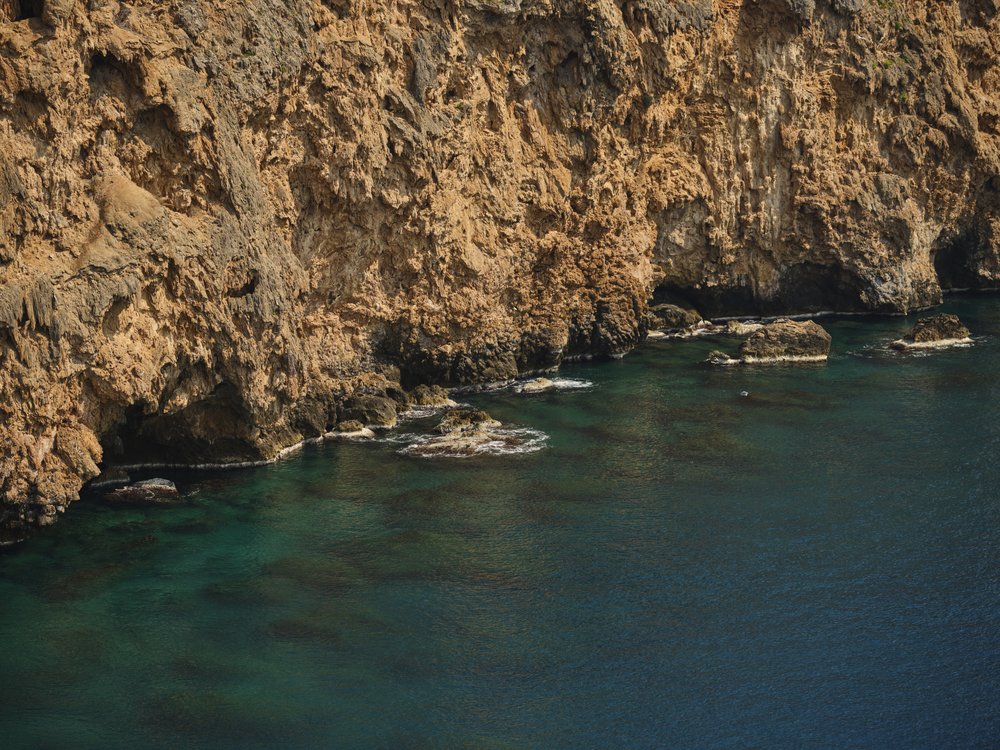 Rugged Cliffs Emerald Waters