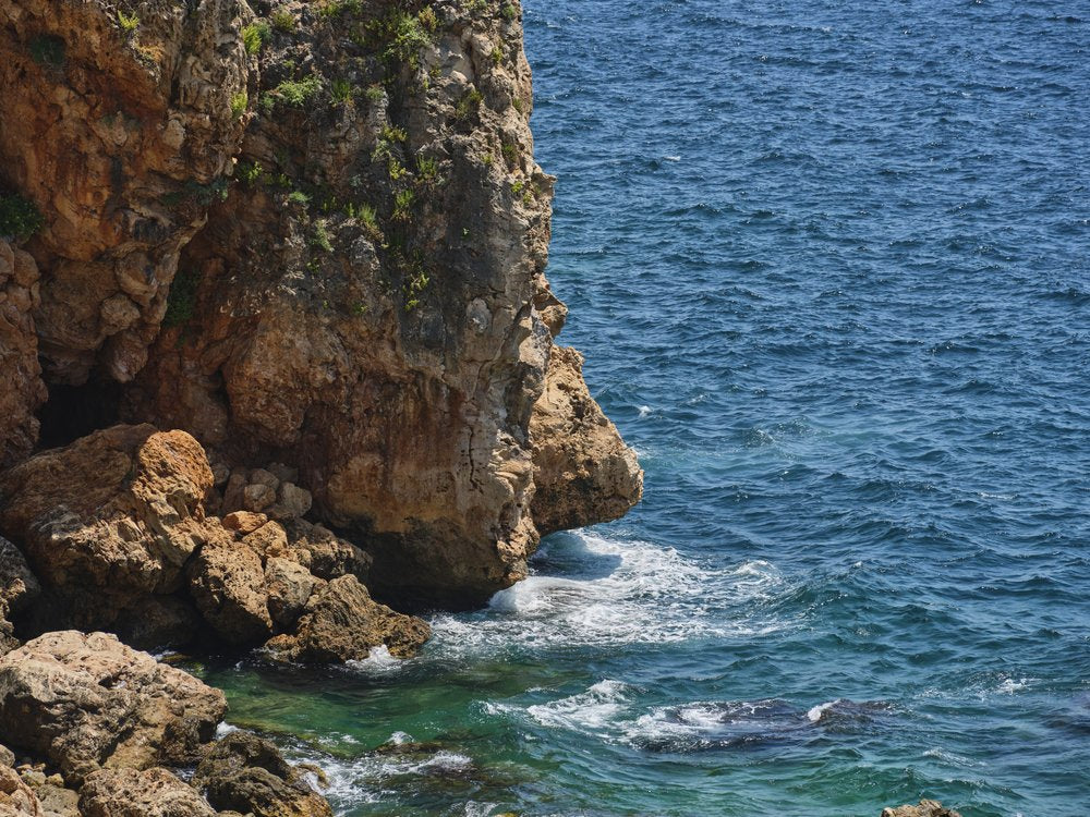 Rugged Cliffs Azure Waters