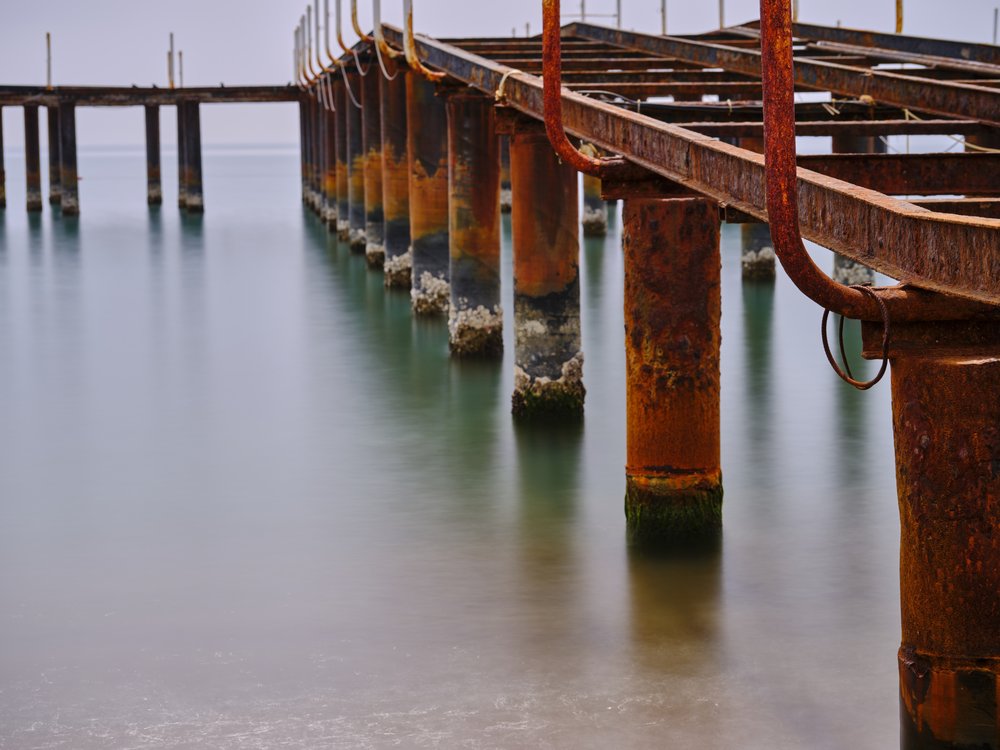 Rusty Pier Over Ocean