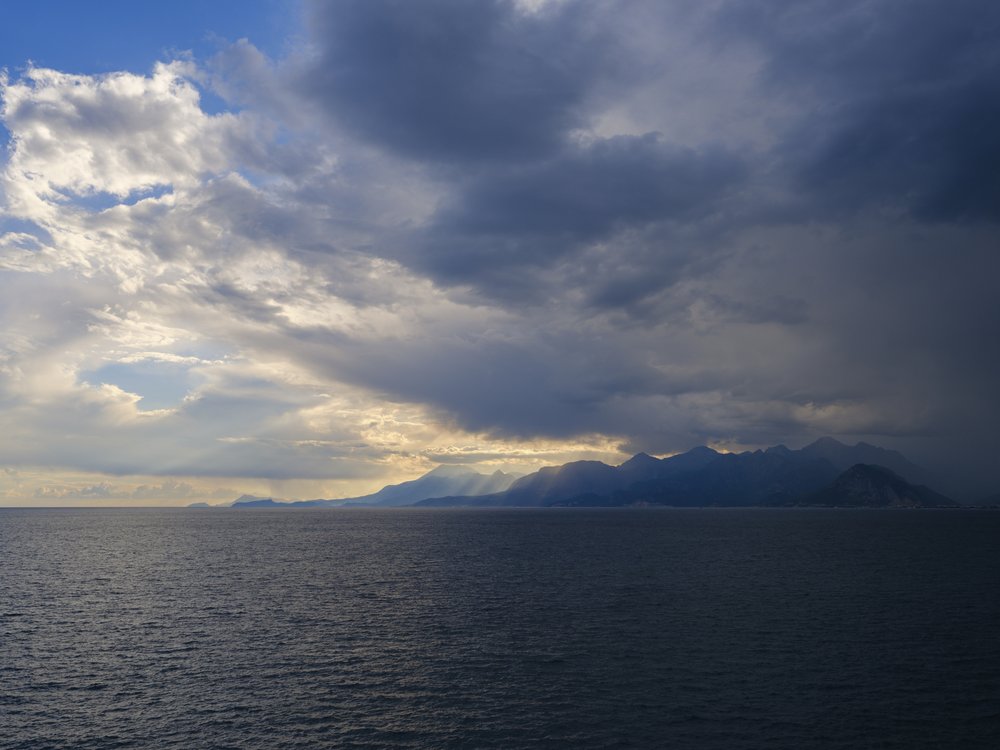 Sunrays Over Dark Ocean