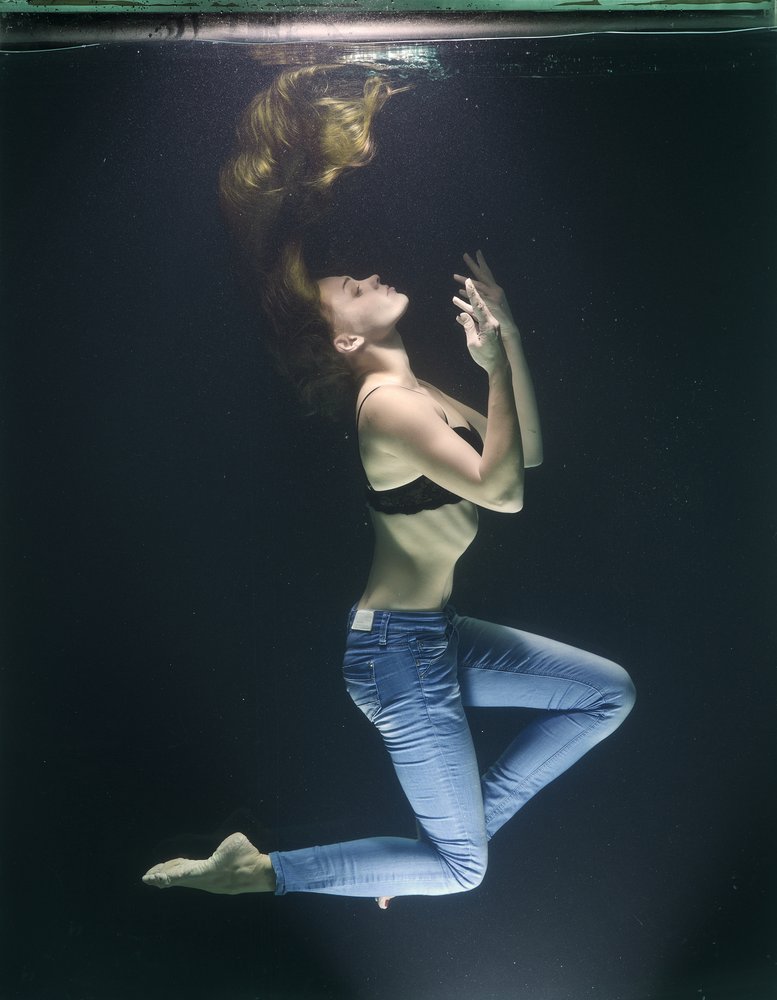 Woman Floating Underwater
