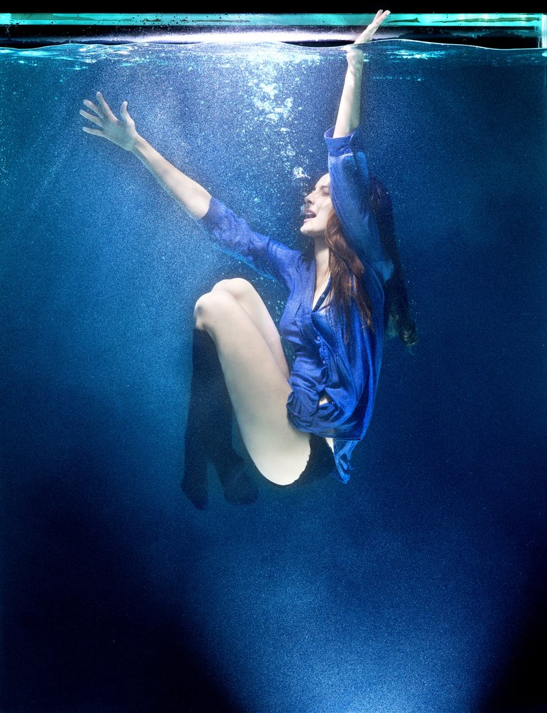 Woman Reaching Upward