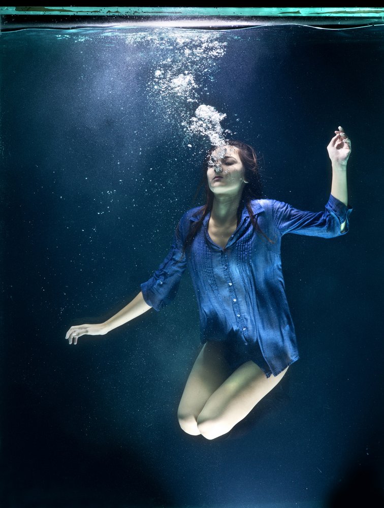 Woman Floating Underwater