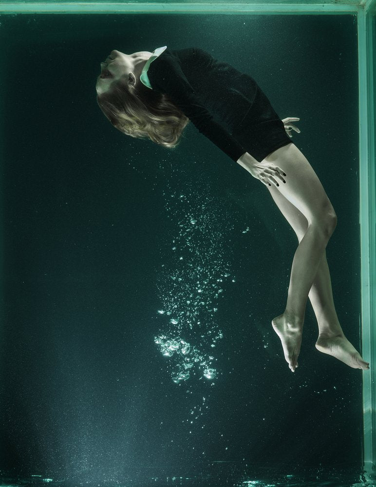 Floating Underwater Woman