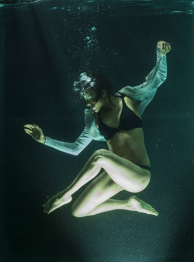 Floating Woman Underwater