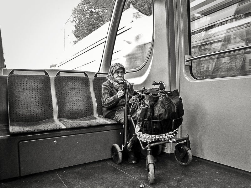 Elderly Woman on Train