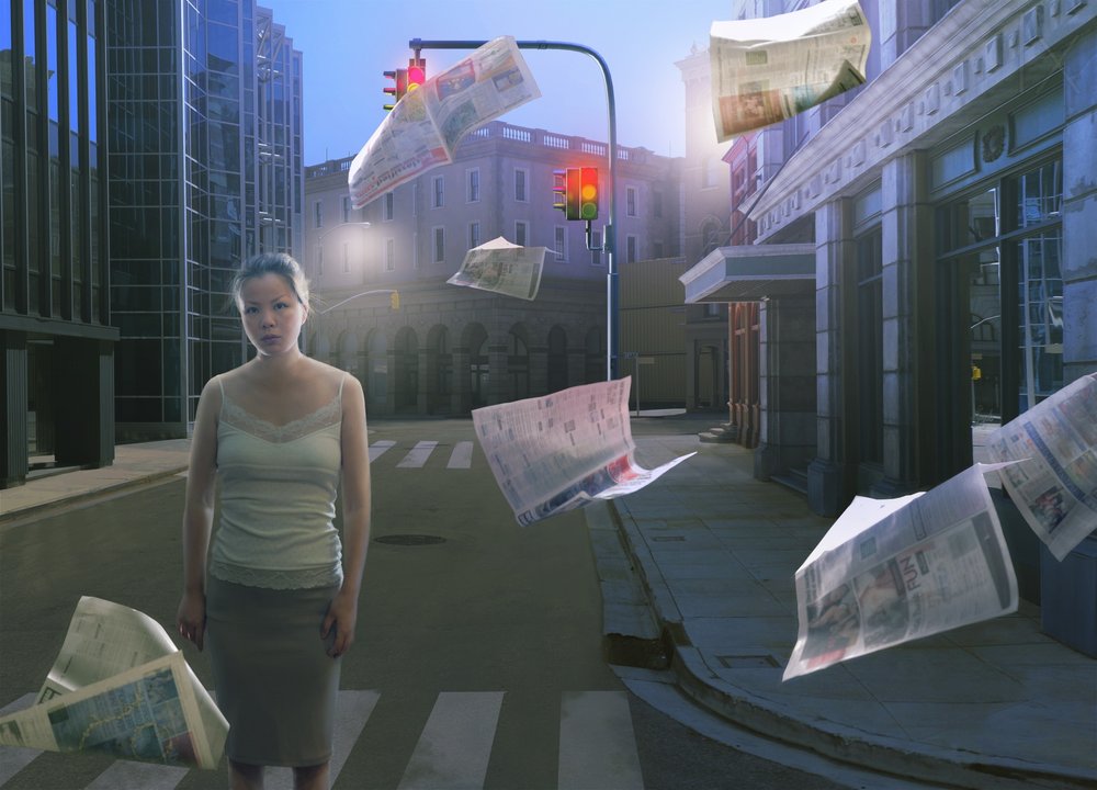 Woman and Flying Newspapers