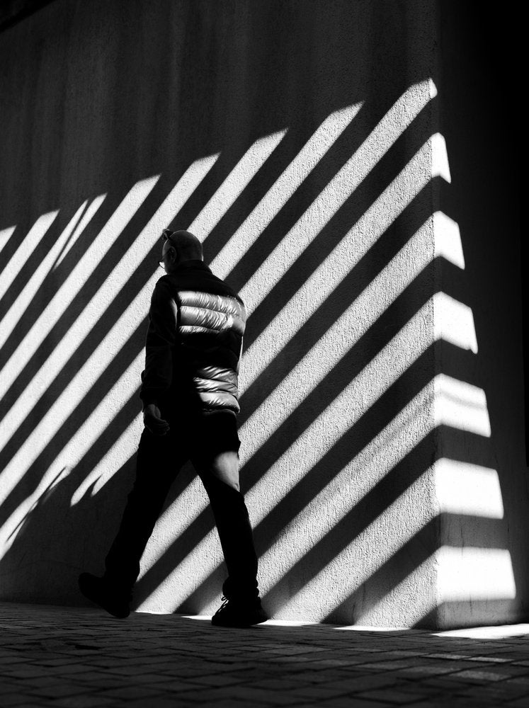 Man In Striped Shadows