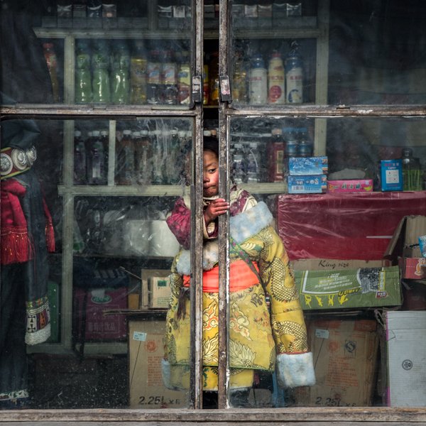 Curious Child In Shop