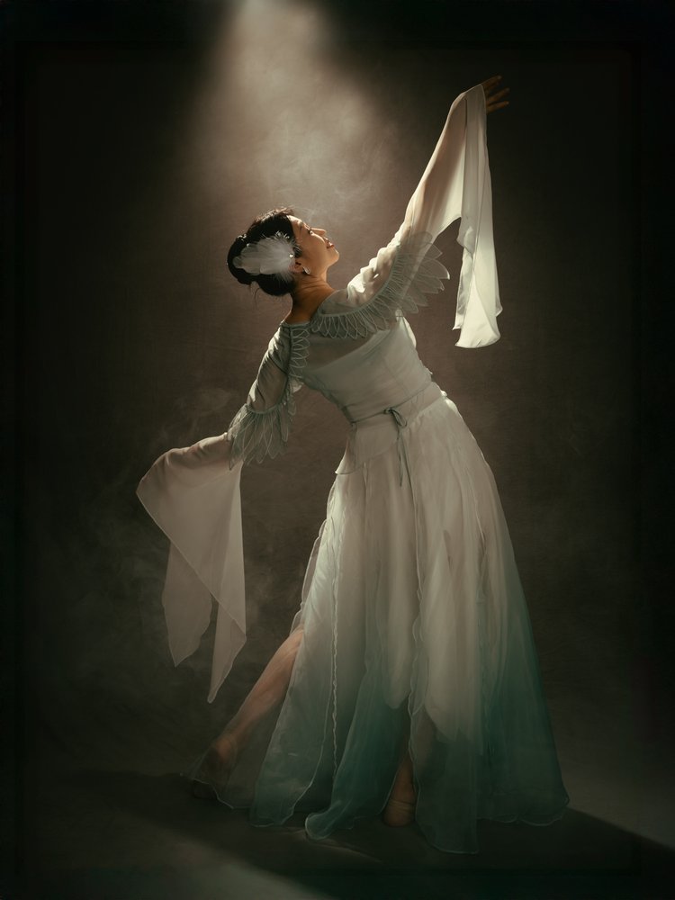 Graceful Dancer in Spotlight