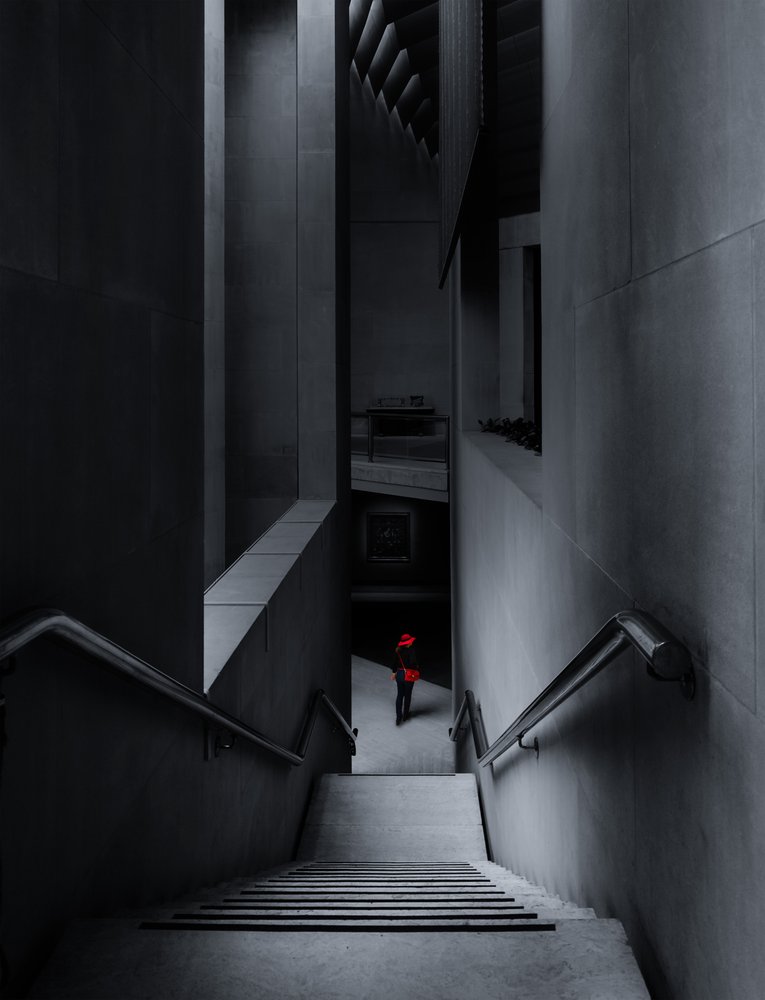 Red Figure on Stairs