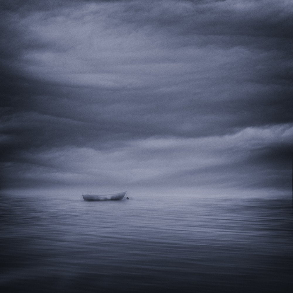 Solitary Boat Moody Sky