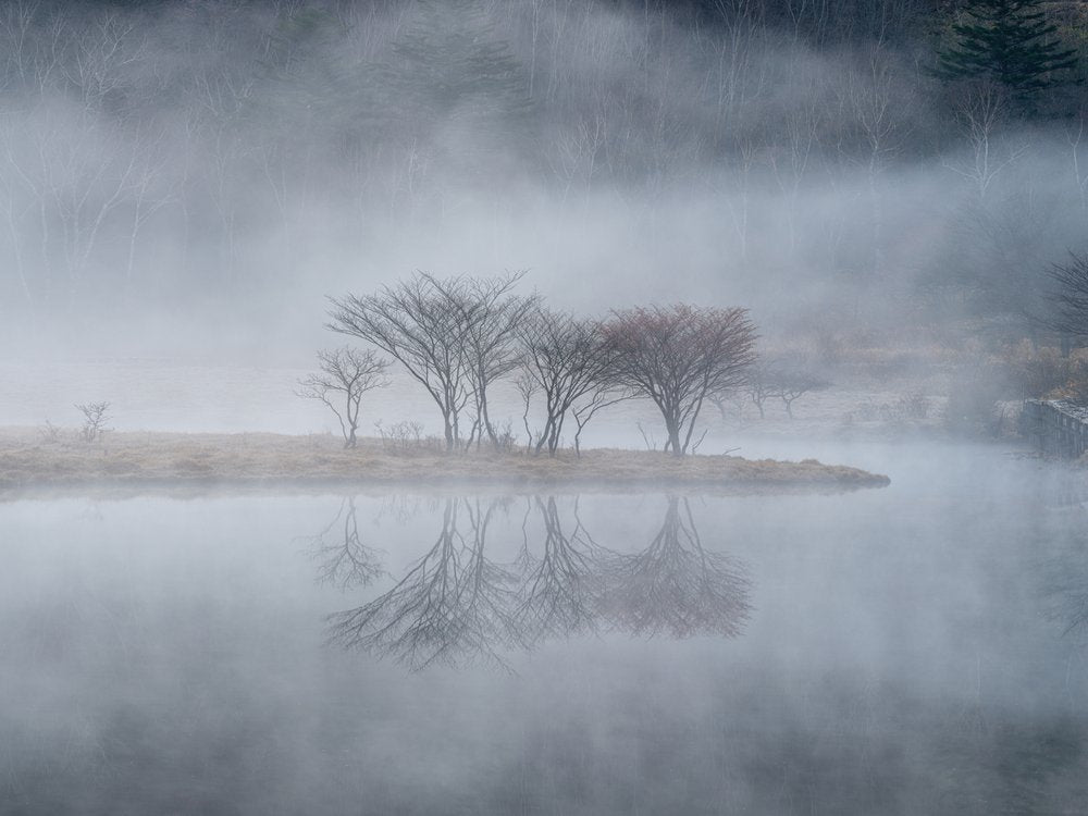 Misty Lake Reflection