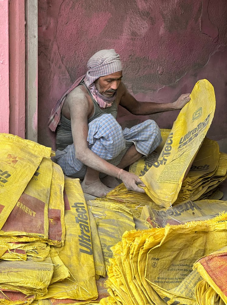 Man Sorting Cement Bags